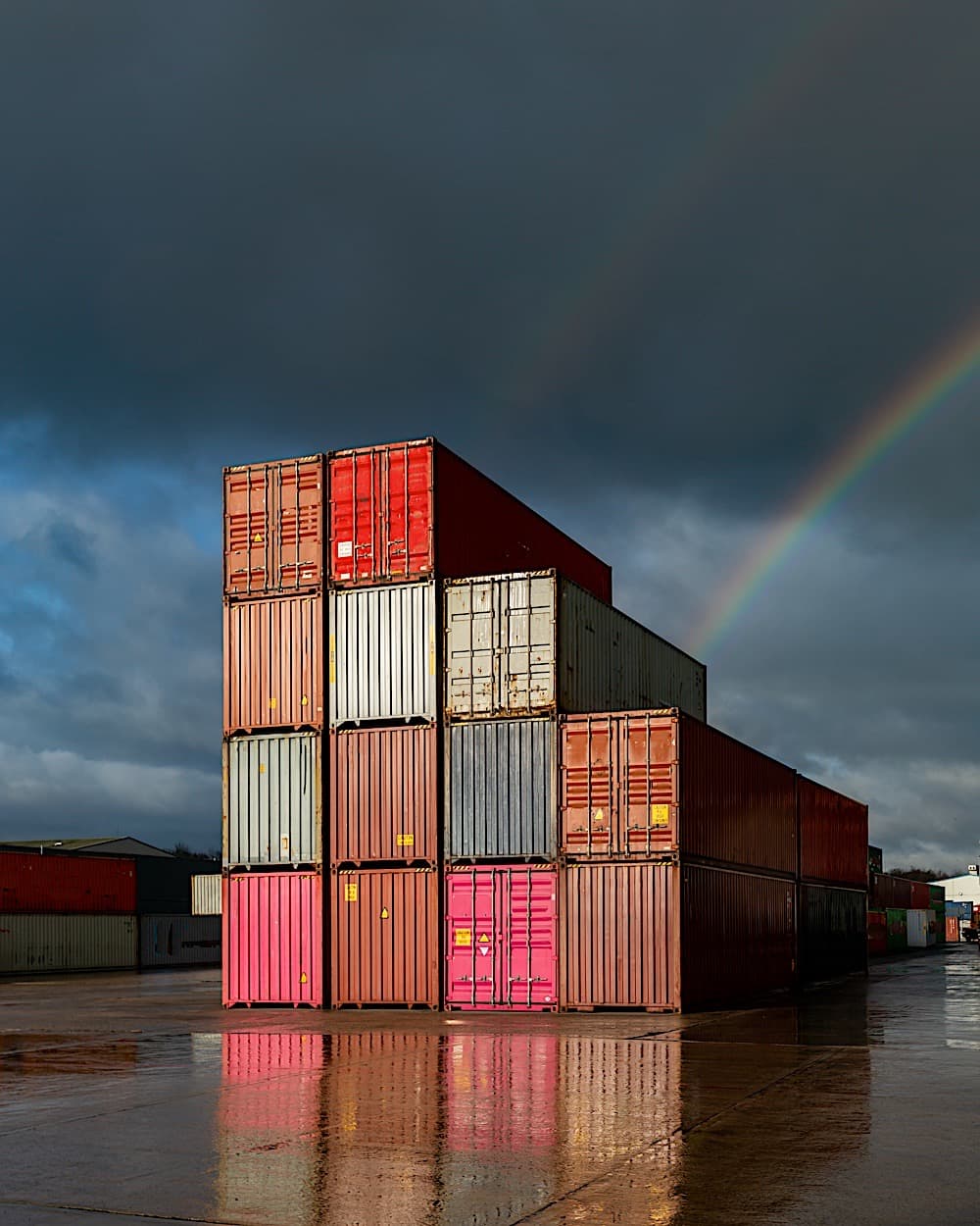 https://quvisolar.com/wp-content/uploads/2023/09/a-stack-of-shipping-containers-on-a-deserted-dock-2023-04-01-00-07-10-utc.jpg