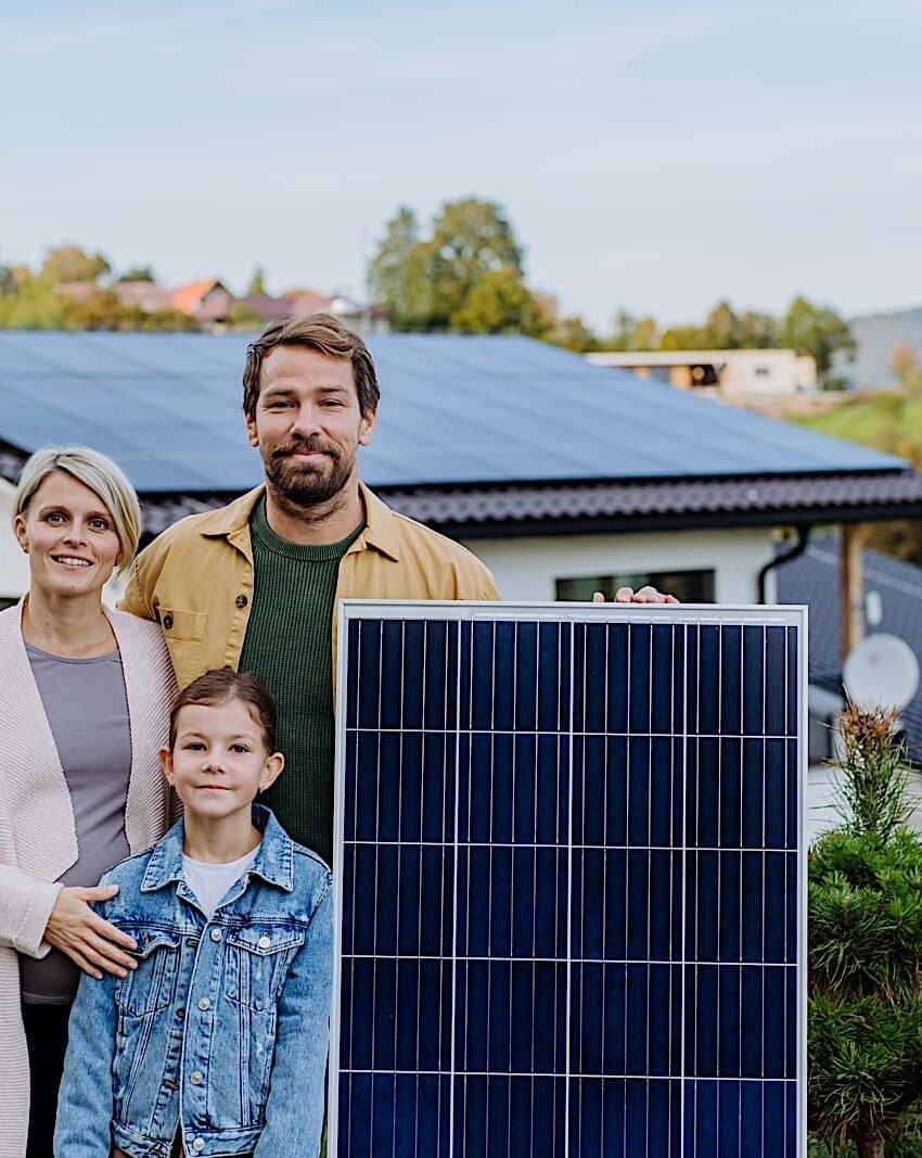 https://quvisolar.com/wp-content/uploads/2023/09/happy-family-near-their-house-with-solar-panel-al-2022-11-02-02-32-28-utc-850x1067.jpg